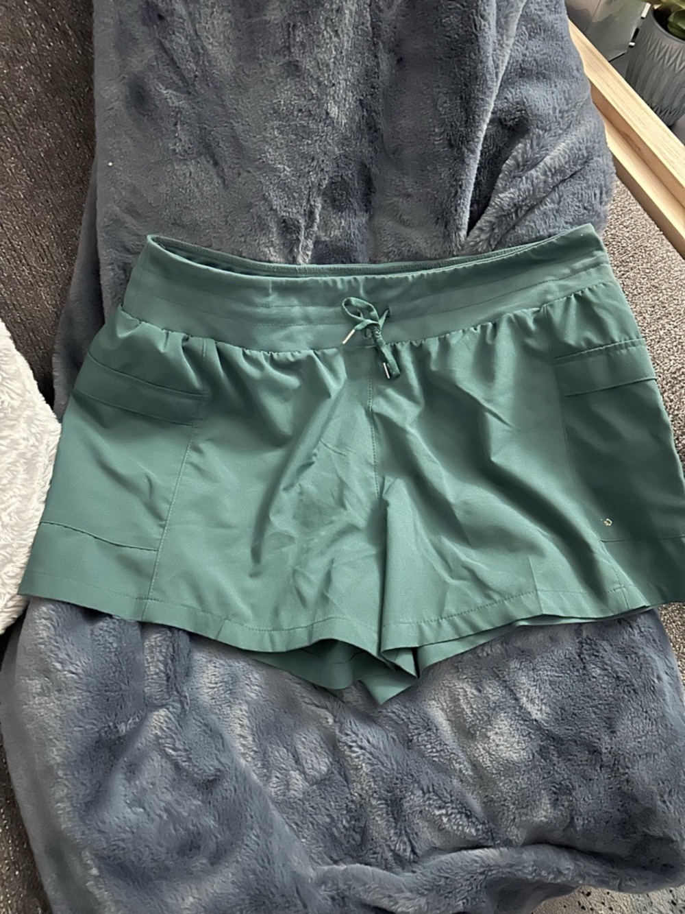 Women’s Teal Athletic Shorts with Drawstring Waist and Dual Front Pockets